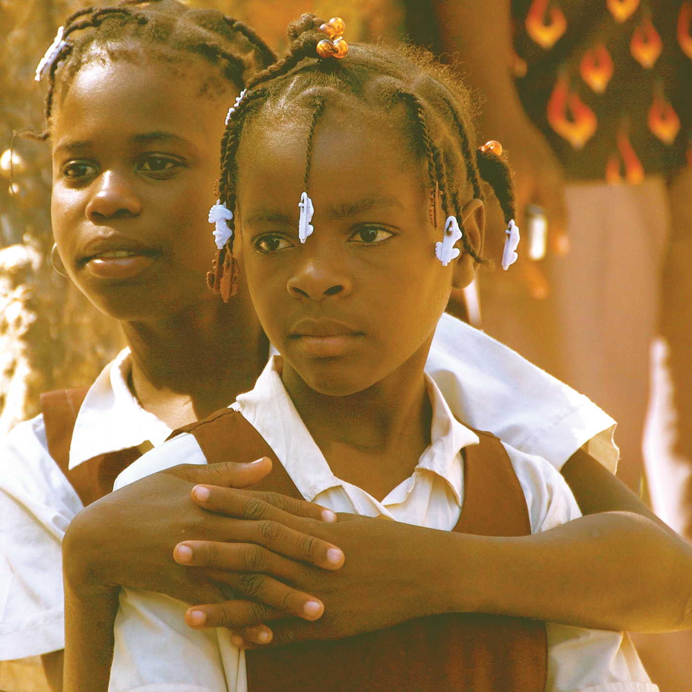 Two girls in school uniform in Anse A Pitre